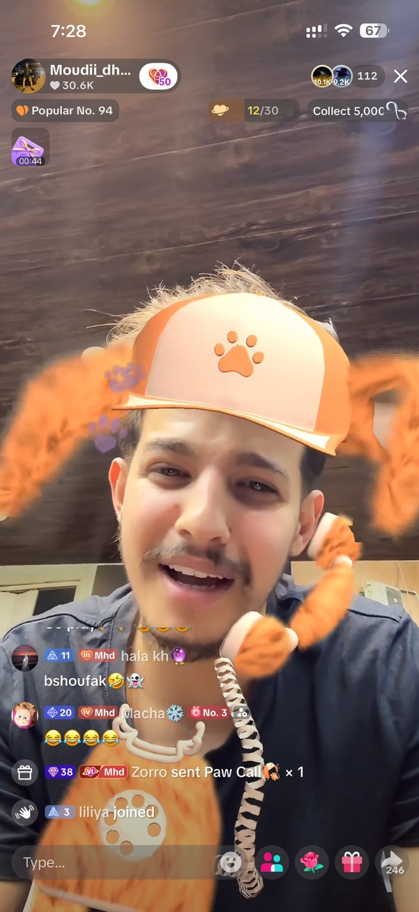 Moudi Dhainy LIVE with paw filter